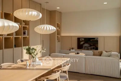 Elegant modern living room with stylish lighting and cozy seating area