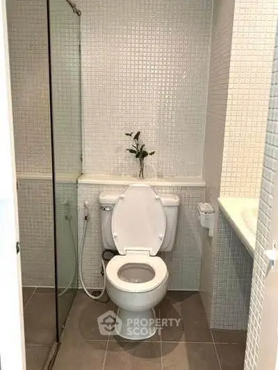 Modern bathroom with sleek design and glass shower enclosure