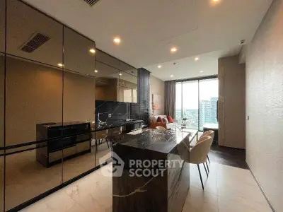 Luxurious modern kitchen with open layout and stunning city view