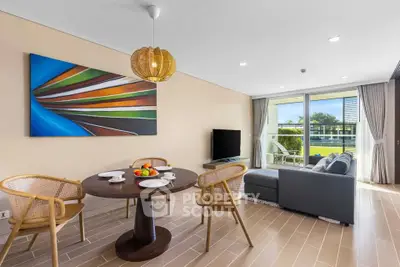 Modern living room with stylish decor and large windows offering a scenic view.