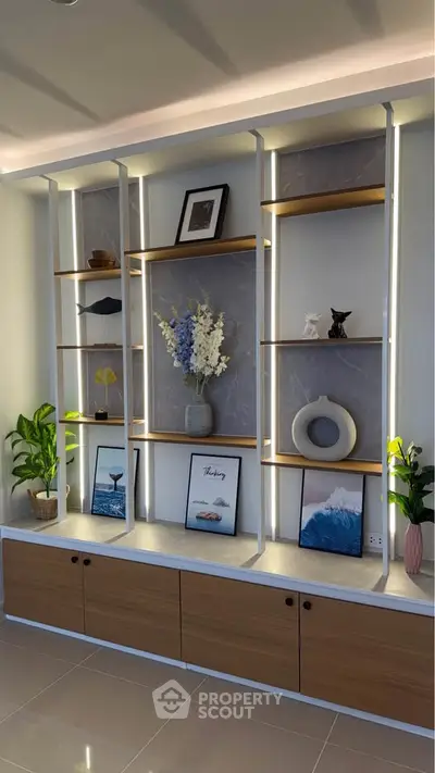 Modern living room with stylish shelving and elegant decor