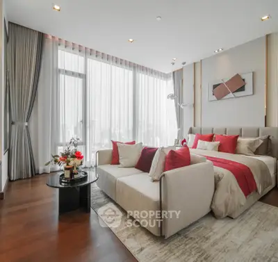 Luxurious modern bedroom with elegant decor and large windows