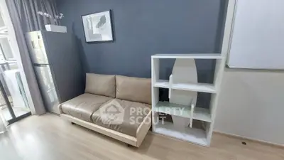 Modern living room with sleek sofa and stylish shelving unit