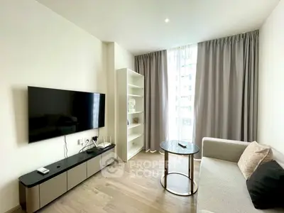 Modern living room with sleek TV setup and elegant furnishings