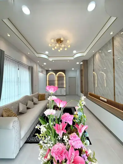 Luxurious living room with elegant decor and modern lighting