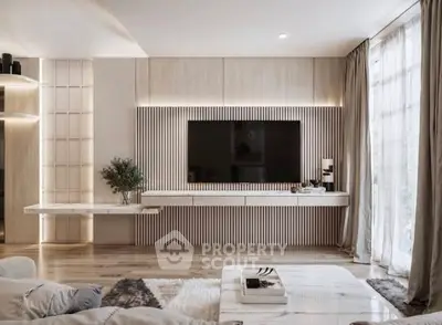 Luxurious modern living room with sleek TV setup and elegant decor