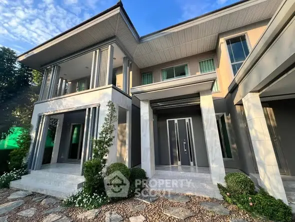 Stunning modern house exterior with elegant design and lush landscaping