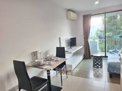 Modern studio apartment with open layout and balcony view