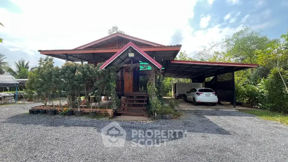 Charming rustic house with carport and lush greenery, perfect for serene living.
