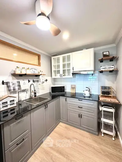 Charming modern kitchen with sleek cabinetry and stylish decor