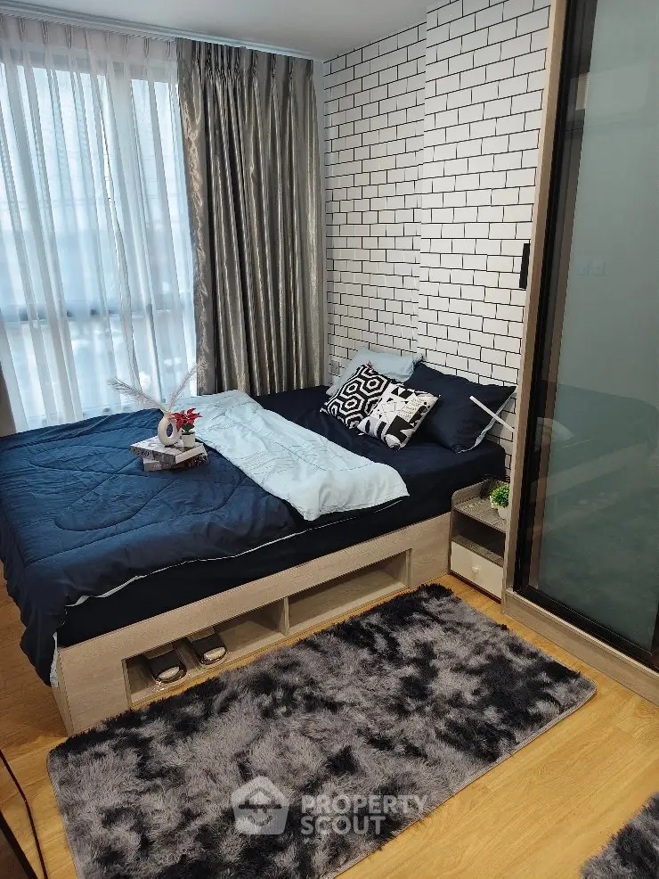 Cozy modern bedroom with stylish decor and natural light