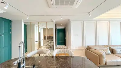 Luxurious modern living room with elegant decor and spacious layout.