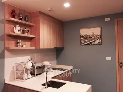 Modern kitchen with sleek wooden cabinets and stylish open shelving