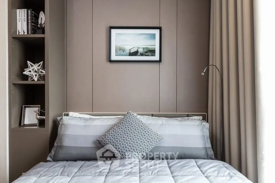 Cozy modern bedroom with stylish decor and soft lighting