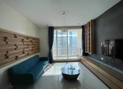 Modern living room with stylish decor and city view balcony