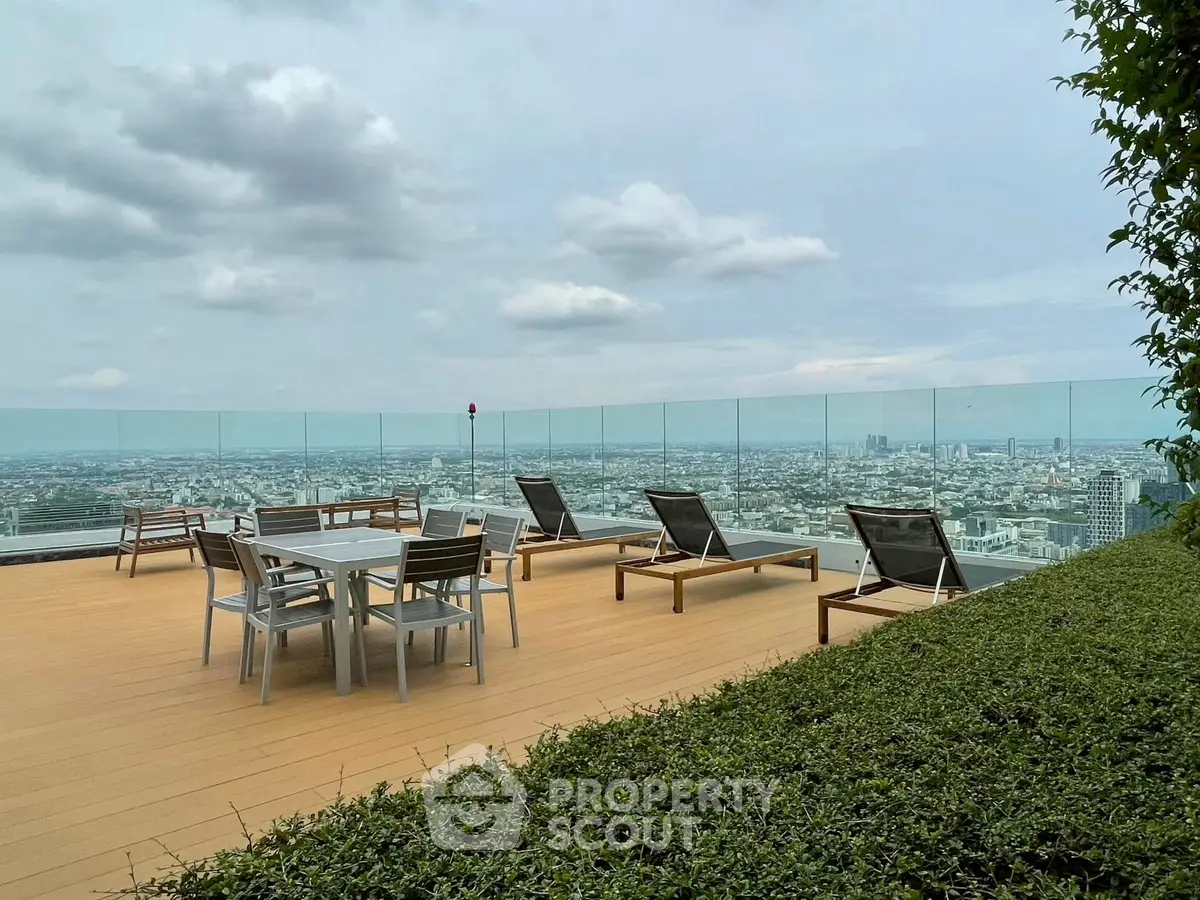 Stunning rooftop terrace with panoramic city views and modern outdoor furniture.