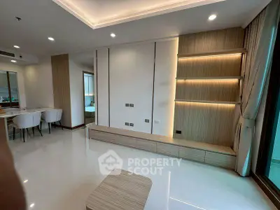 Modern living room with sleek design and ambient lighting