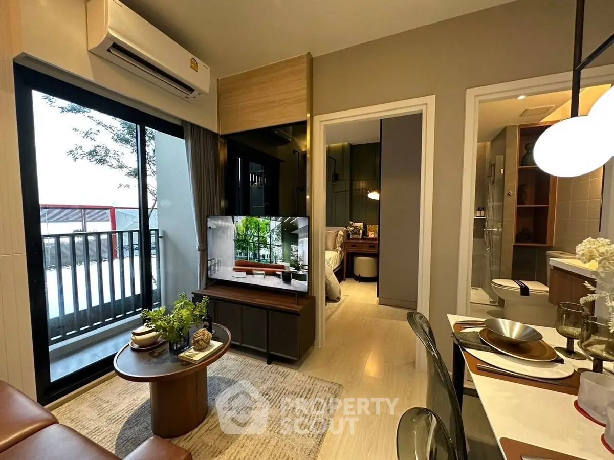 Modern living room with balcony access and stylish decor