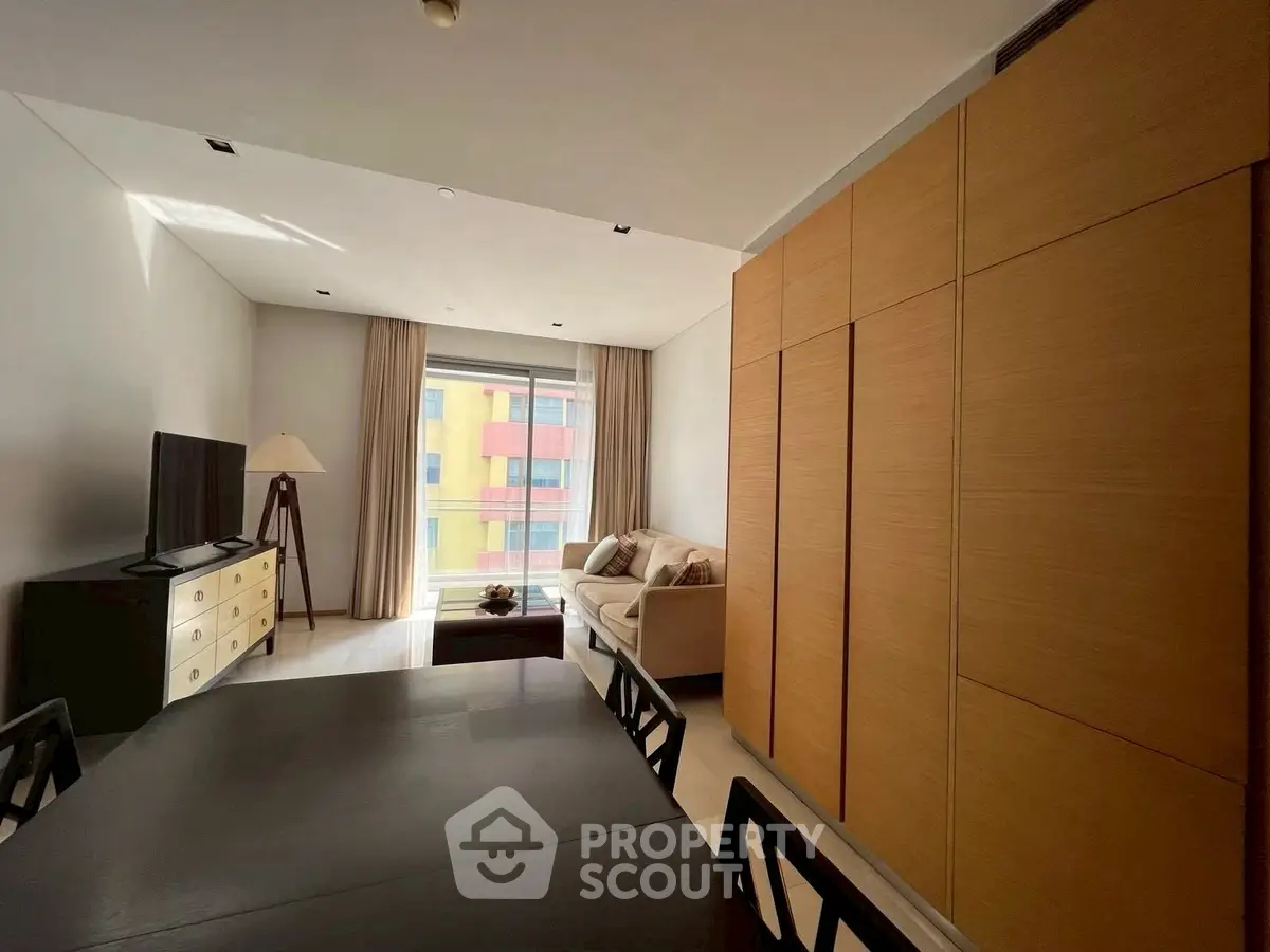 Modern living room with natural light and stylish furniture