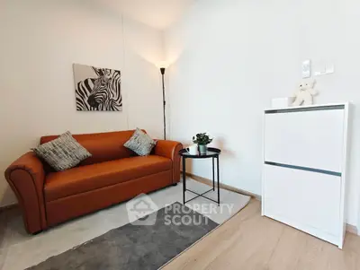 Cozy living room with stylish brown sofa and modern decor