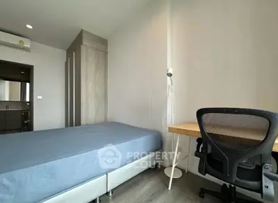 Modern bedroom with study area and sleek design