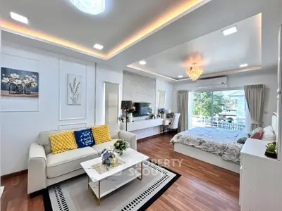 Spacious modern living room with elegant decor and natural light
