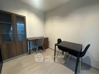 Modern study room with sleek furniture and ample natural light