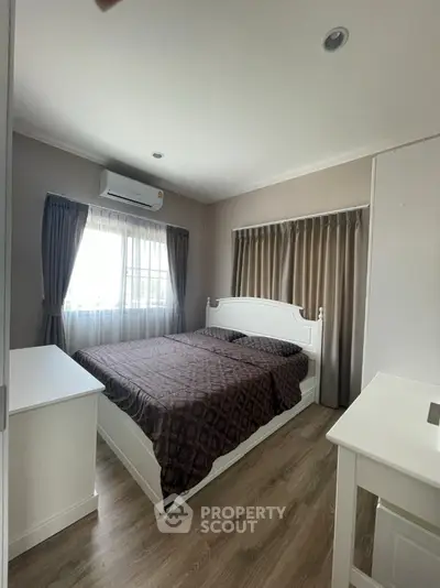 Cozy bedroom with elegant decor and natural light
