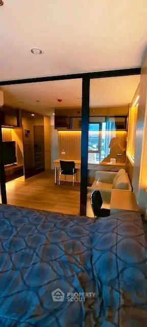 Modern studio apartment with stylish interior and cozy lighting