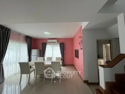 Spacious dining area with modern decor and natural light