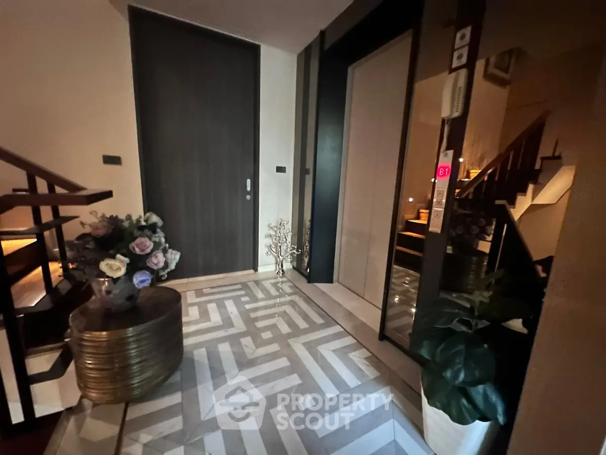 Elegant entrance with modern decor and stylish flooring