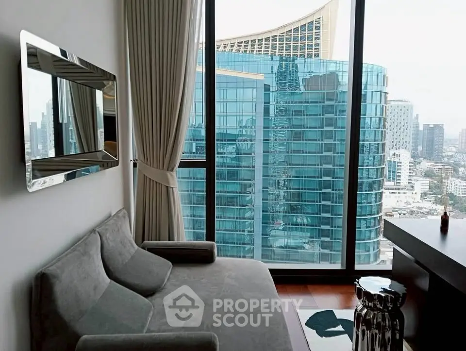 Luxurious living room with stunning city view from floor-to-ceiling windows