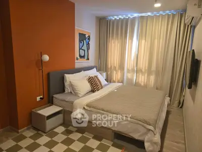 Cozy modern bedroom with stylish decor and natural light