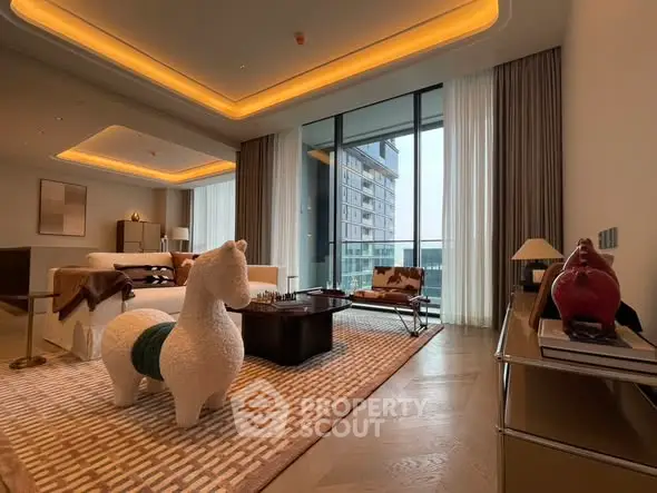 Luxurious living room with modern decor and large windows offering stunning views.