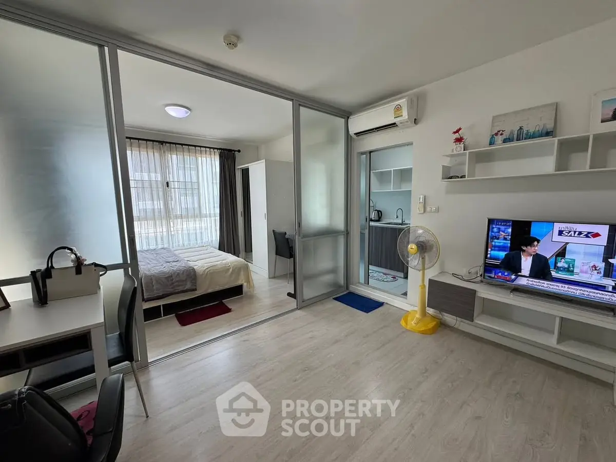 Modern studio apartment with open layout and stylish furnishings