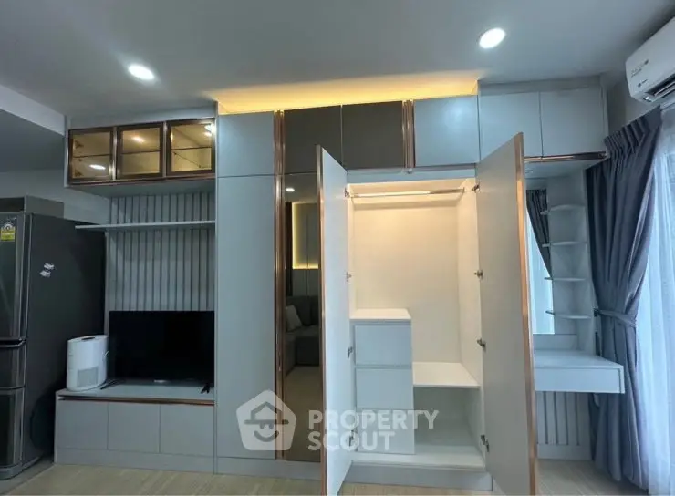 Modern apartment interior with built-in storage and sleek design