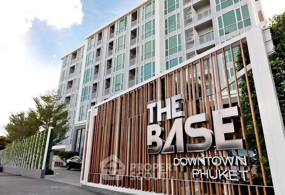 Modern condominium building with stylish entrance in downtown Phuket.