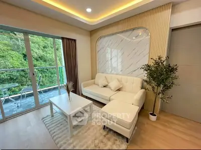 Modern living room with elegant decor and balcony view