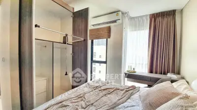 Cozy bedroom with modern wardrobe and natural light