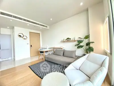 Bright and modern living room with stylish furniture and natural light