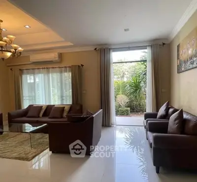 Spacious living room with elegant furniture and garden view