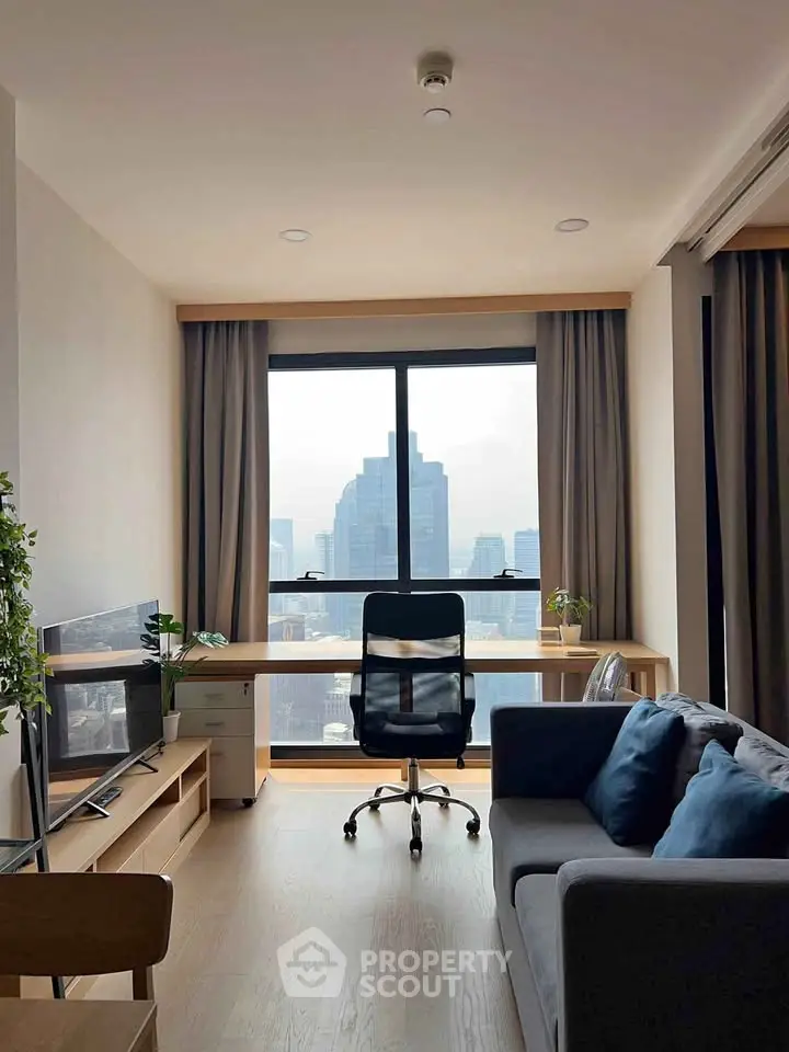 Modern living room with city view, stylish furniture, and natural light.