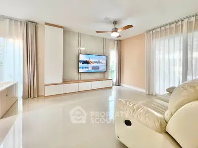 Spacious modern living room with sleek design and natural light