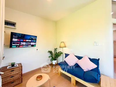 Cozy living room with modern TV setup and stylish decor