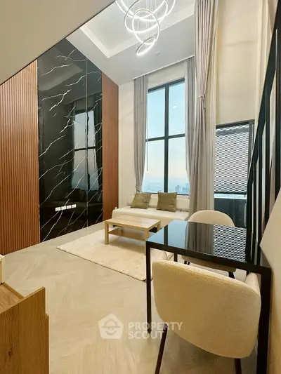 Modern living room with elegant decor and large window view