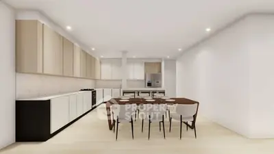 Spacious modern kitchen with sleek cabinetry and dining area