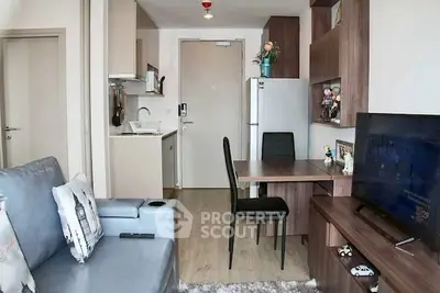 Modern compact living room with integrated kitchen and stylish decor