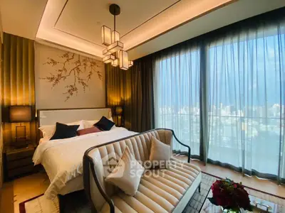 Luxurious bedroom with city view, elegant lighting, and stylish decor in a high-rise apartment.