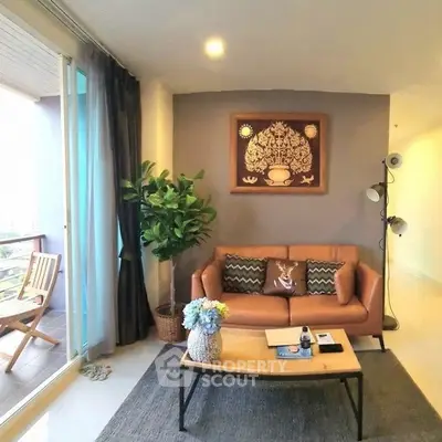 Cozy living room with modern decor and balcony view