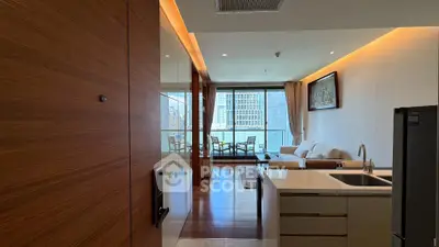 Modern open-layout apartment with spacious living room and balcony view